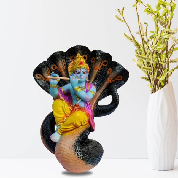 KRISHNA ON VASUKHI NAAG STATUE IN POLYMARBLE- 16 CM HEIGHT