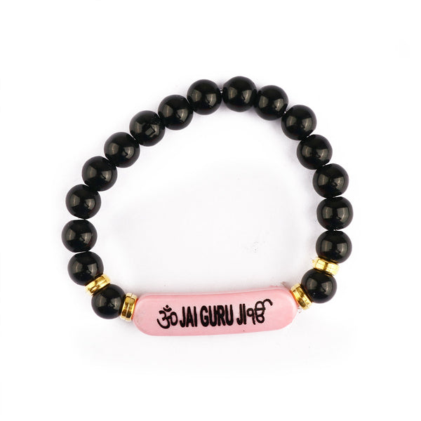 Exquisite Pink Om Jai Guruji Bracelet with Black Beads